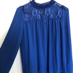 Blue lace-collared blouse